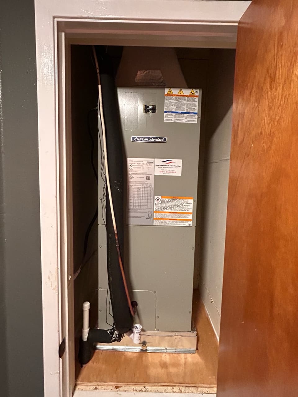 American Standard air handler in a closet, installed by Total Assurance